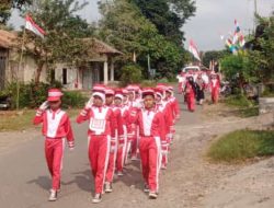 Ratusan Siswa SD/SMP/SMA Di Katibung Meriahkan HUT RI ke-79 Dengan Lomba Gerak Jalan